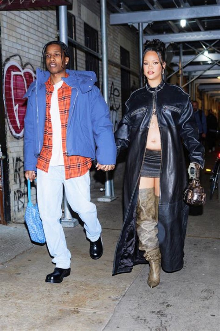 
Rihanna Slays Thigh High Boots & Mini Skirt Out With A$AP Rocky In NYC 